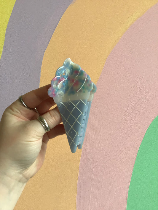Blue ice cream hair claw with teal translucent scoop and gold lattice cone