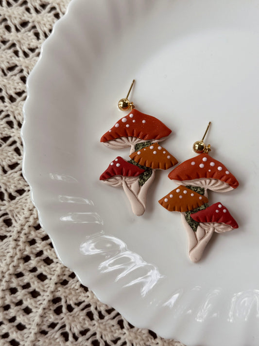 Mushroom drop earrings with gold studs, orange caps with white gills