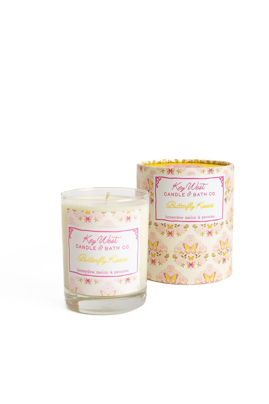 Glass jar candle with butterfly floral print and pink label