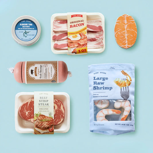 Organic meat and seafood toy pack with bacon, tuna cup, shrimp, and beef steak packages