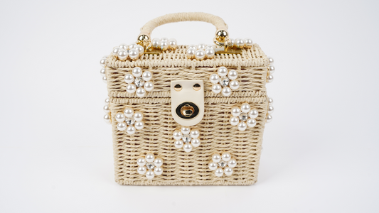 Beaded mini straw handbag with pearl-like accents and gold-tone clasp