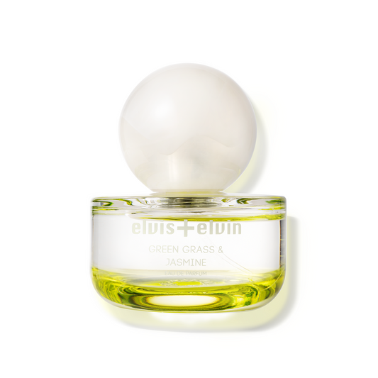 Green Grass & Jasmine Eau de Parfum bottle with gold cap and green-tinted glass