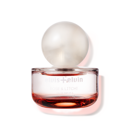 Rose & Litchi eau de parfum bottle with rounded glass dome cap