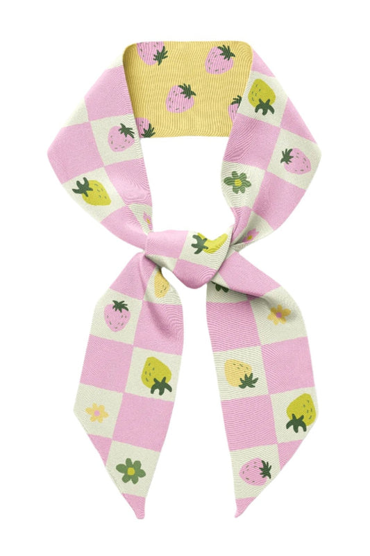 Pastel checkered fruit print twilly scarf tied in a bow, pink and yellow