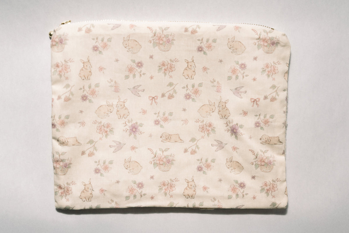 Woodland floral animal print pouch with zipper top and flat back panel