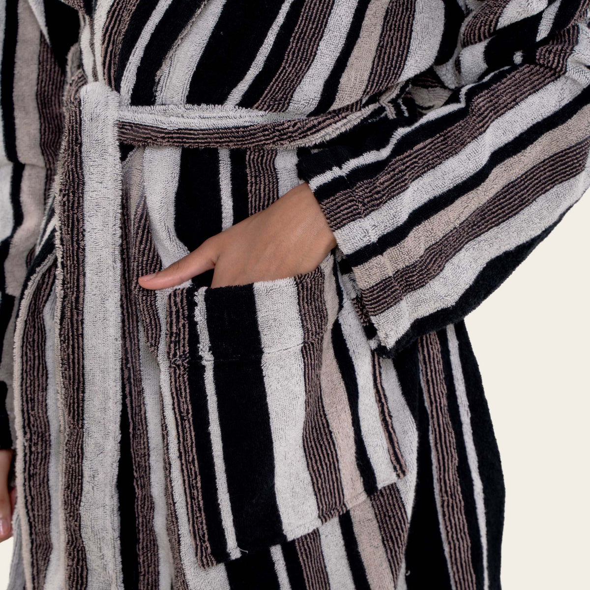Striped unisex cotton bathrobe, maroon, black, and cream vertical stripe close-up