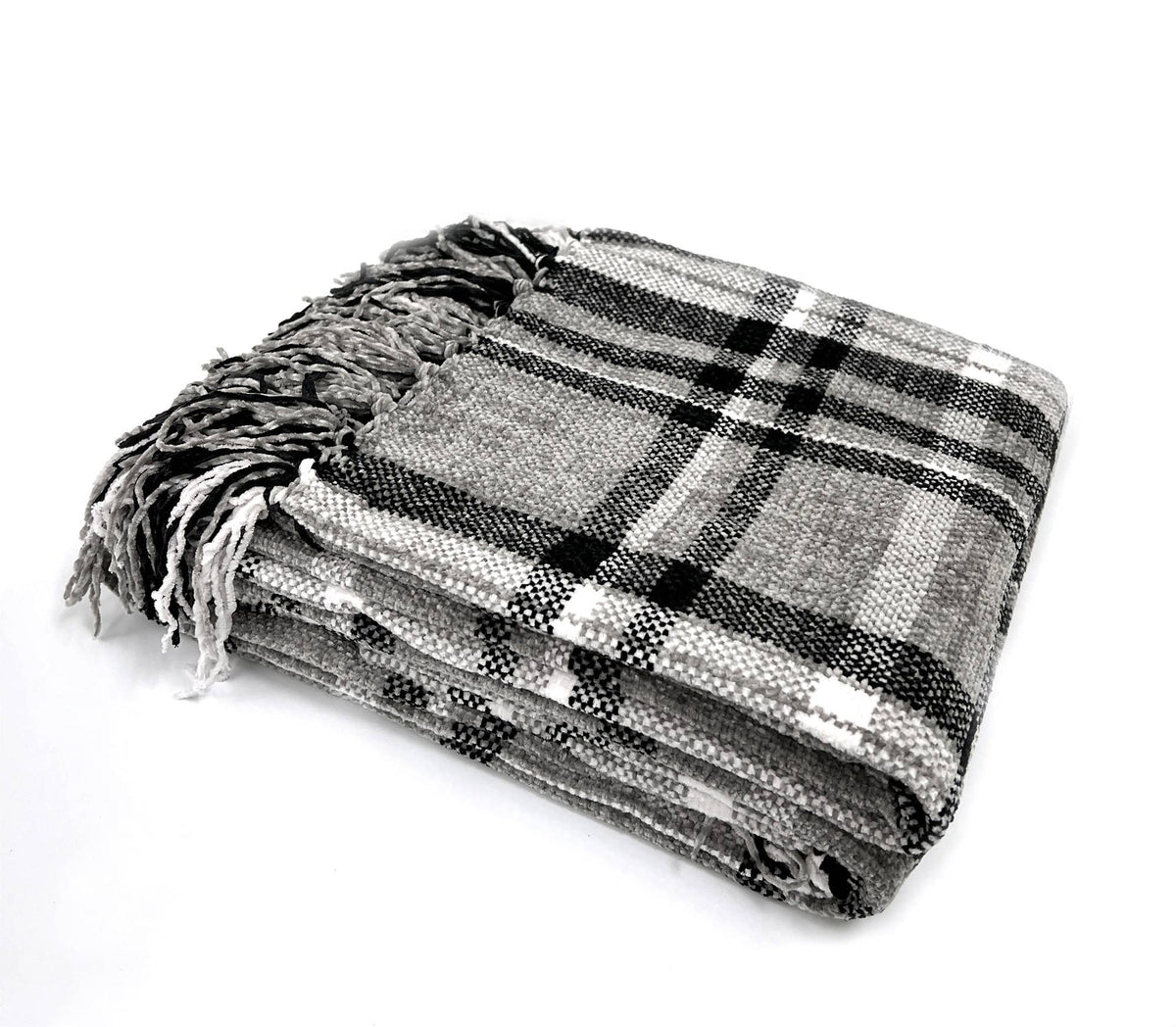 Folded plaid tassel throw blanket in black, white, and gray with fringed ends