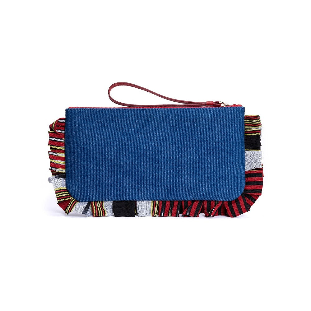 Blue denim clutch with red wrist strap and striped trim peeking from the edge