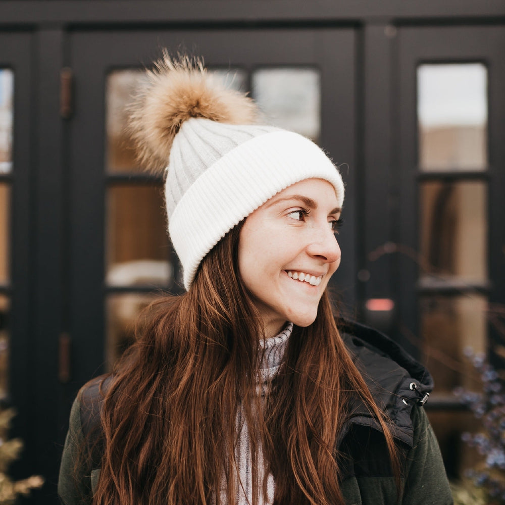 Two-tone knit beanie in cream with brown fur pom