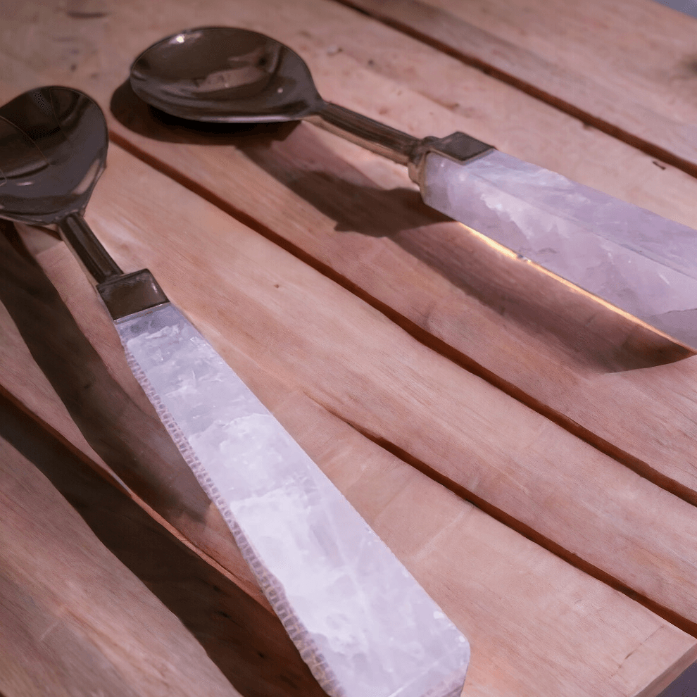 Rose quartz serving spoons with rose-gold metal scoops and long pink stone handles