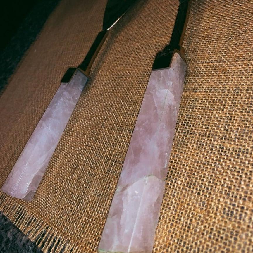Pair of rose quartz serving spoons with rose-gold scoops and pink stone handles