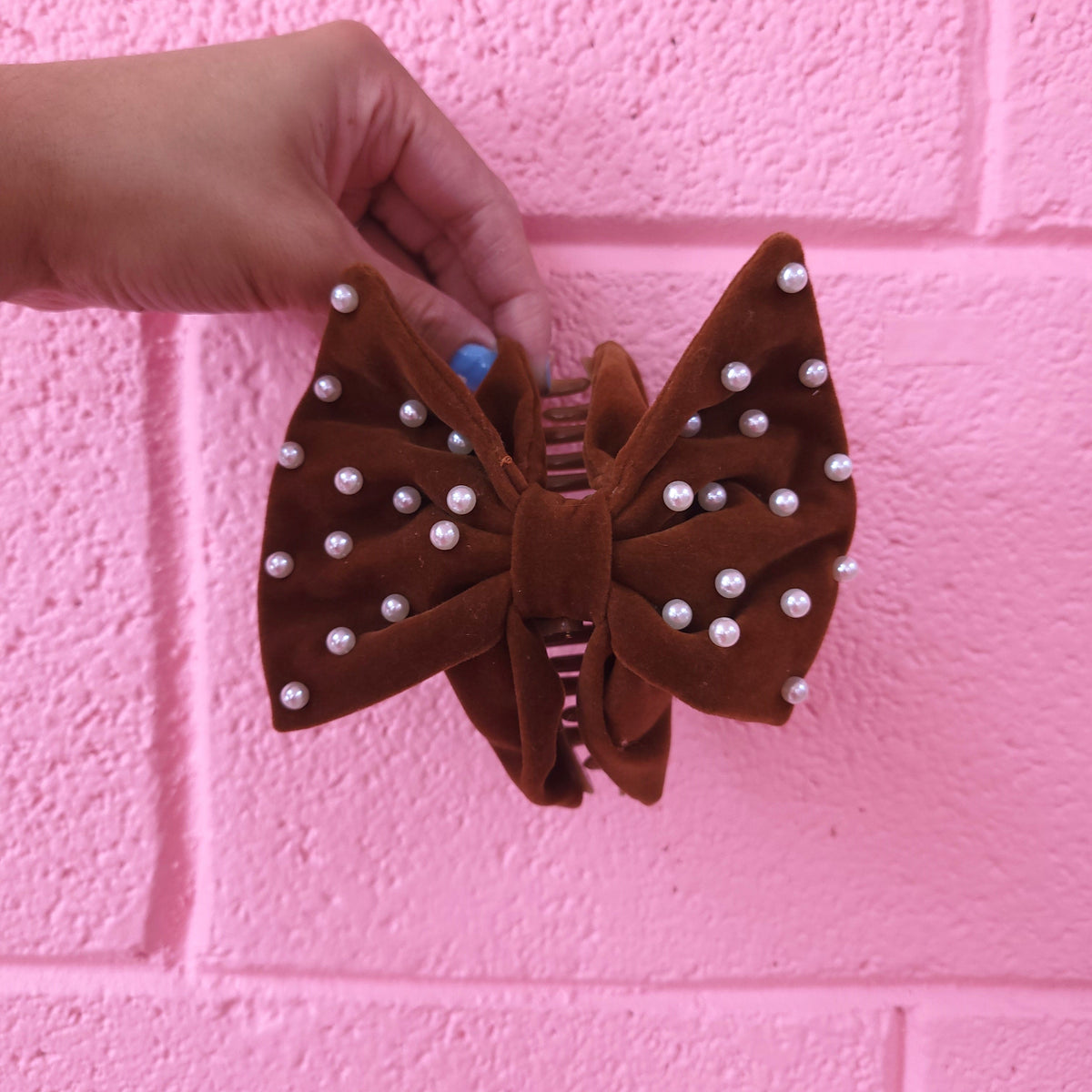 Brown bow hair claw with pearl dots and velvet knot accent