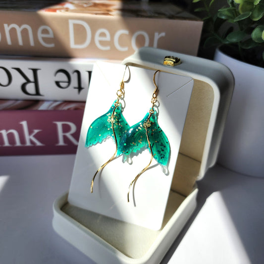 Teal green glitter mermaid tail dangle earrings with gold-tone hooks