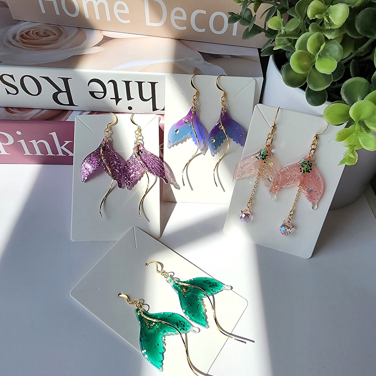Purple glitter mermaid tail dangle earrings with gold-tone hooks