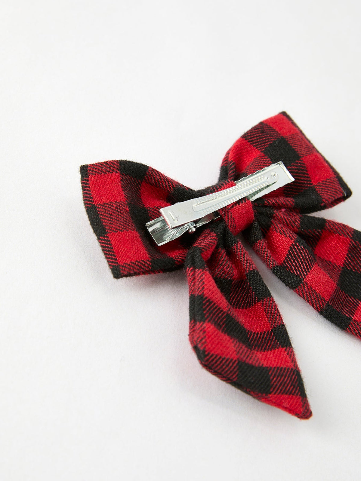 Red and black plaid bow hair clip with silver barrette and knot