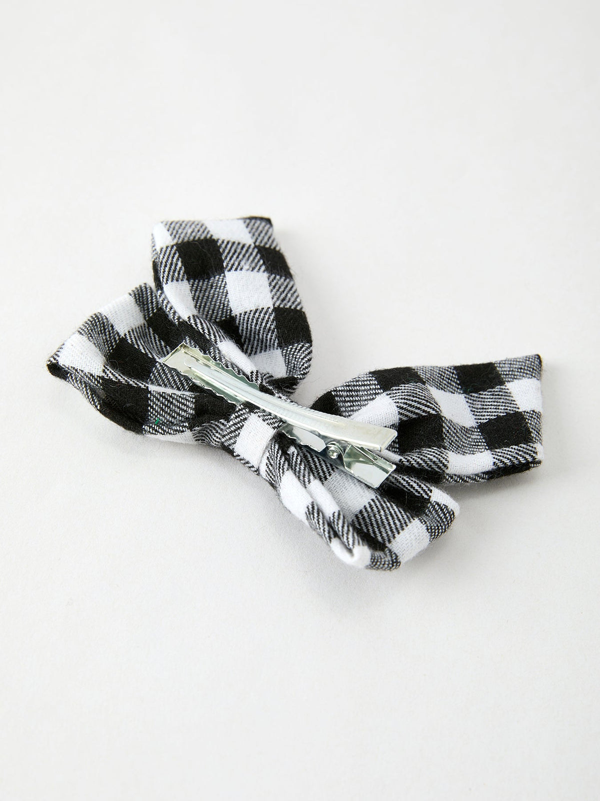 Black-and-white plaid bow hair clip with silver barrette clip