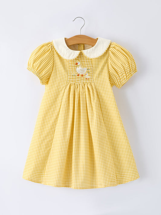 Yellow gingham smocked dress with embroidered goose and puff sleeves