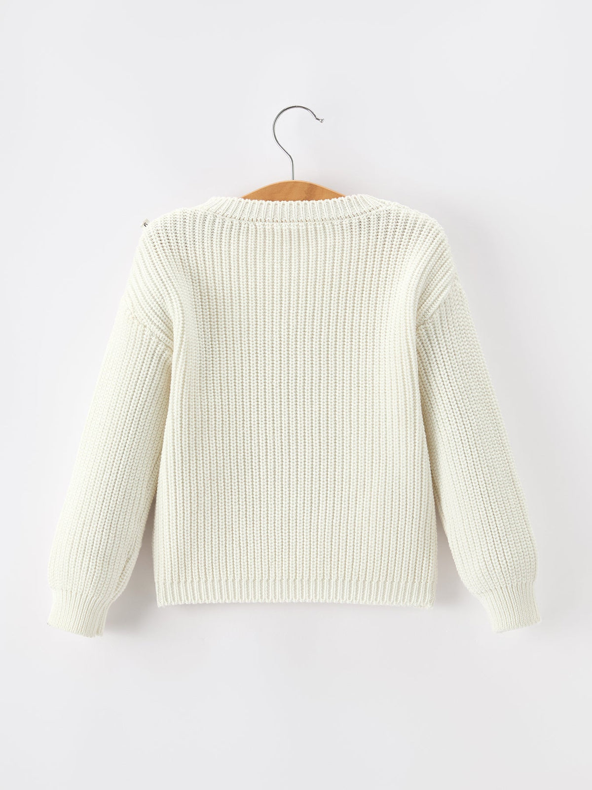 Girls cream knit pullover sweater with round ribbed neckline, plain back view
