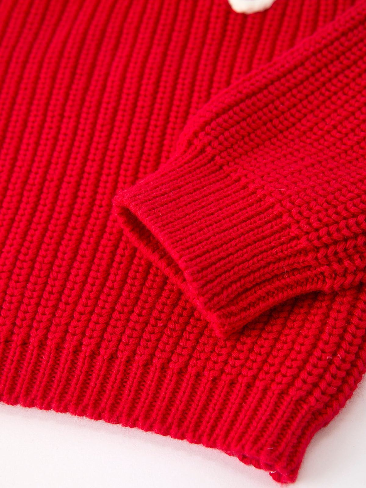 Red ribbed knit pullover sweater with thick cuff and hem