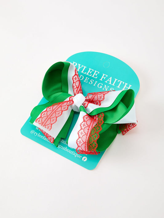 Christmas bow hair clip with green ribbon and red lace layers