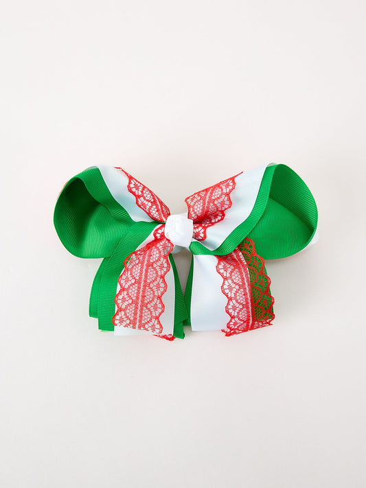 Green and red layered bow hair clip with white center