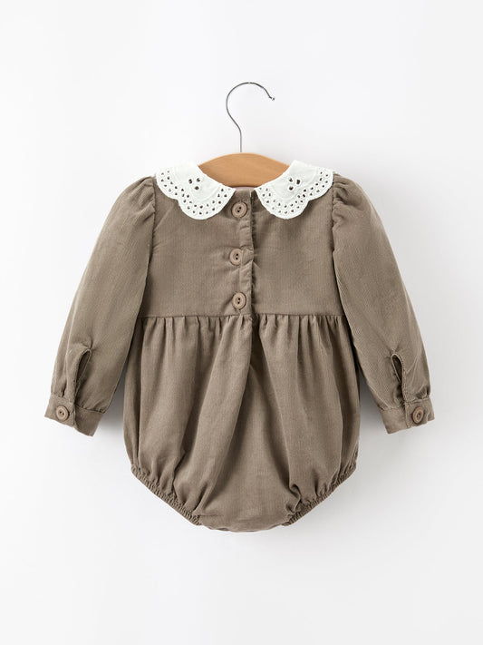 Taupe long-sleeve baby romper with white eyelet Peter Pan collar and front buttons