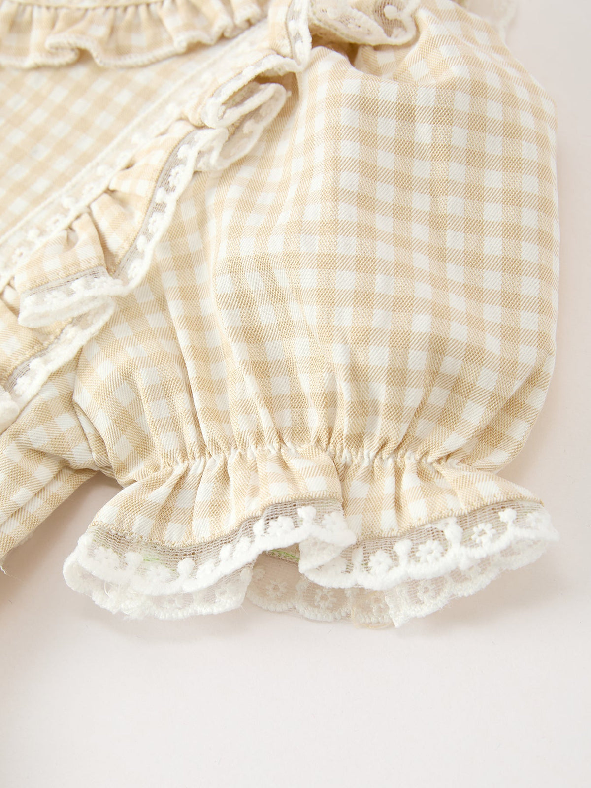 Girls plaid dress with lace-trimmed collar ruffles and bow-tie back