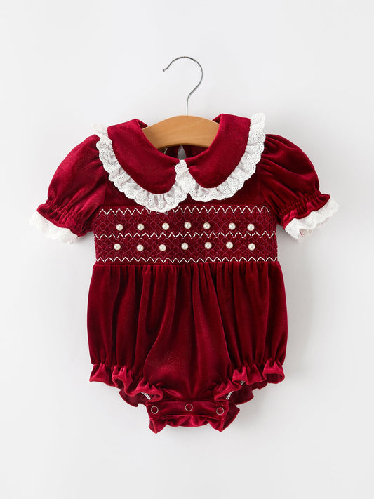 Burgundy velvet baby romper with white scalloped Peter Pan collar and ruffle trim