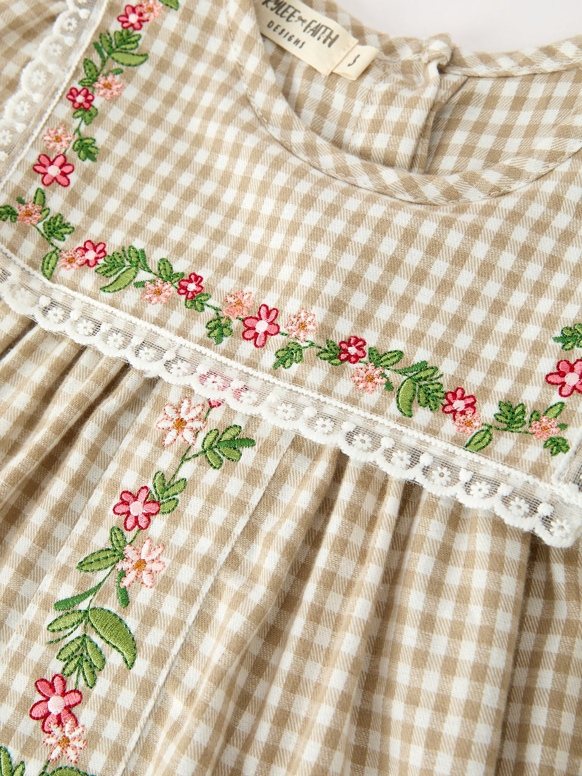 Gingham plaid girls dress with colorful flower embroidery and white lace neckline trim