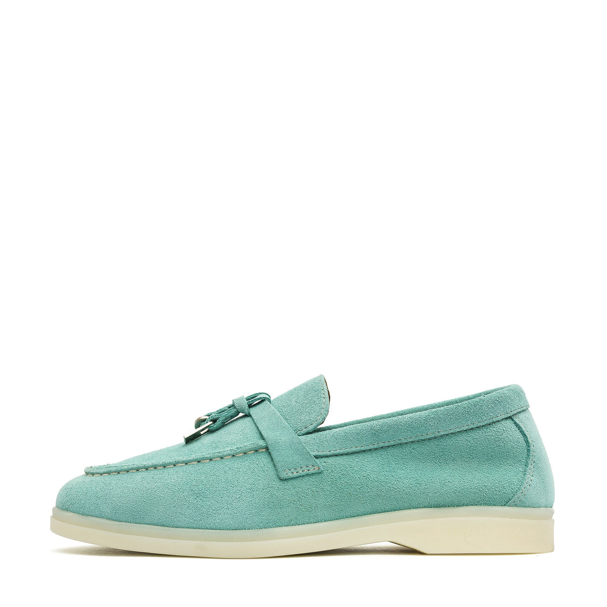 Turquoise suede loafer in side profile with a metal bit accent