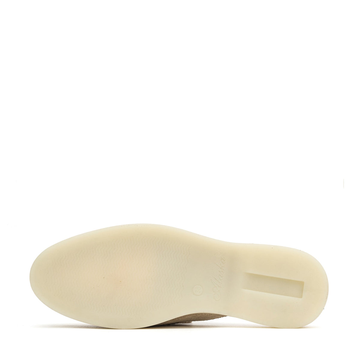 Underside of a mule showing its smooth cream sole