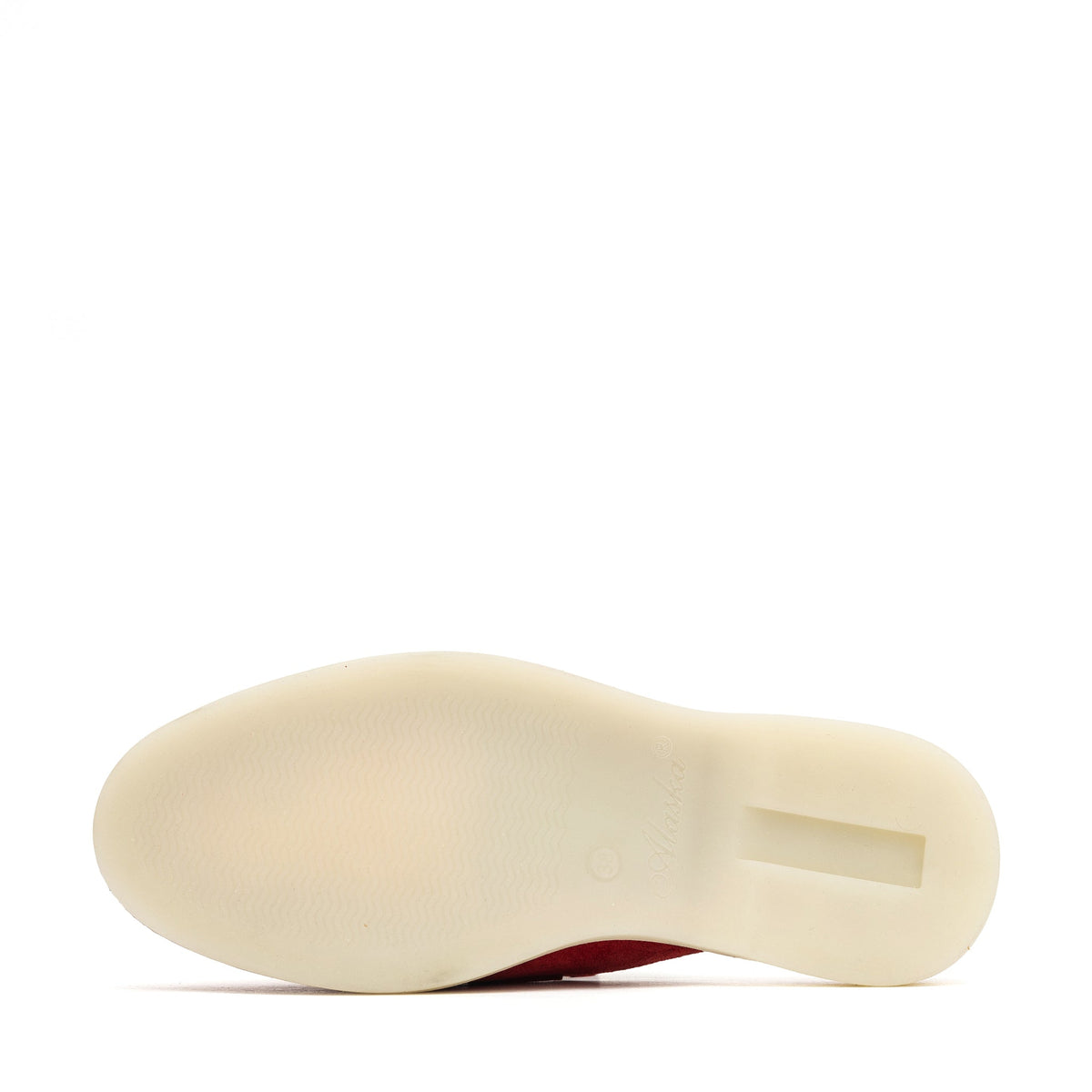 Red suede mule shown from below, displaying its smooth cream sole.