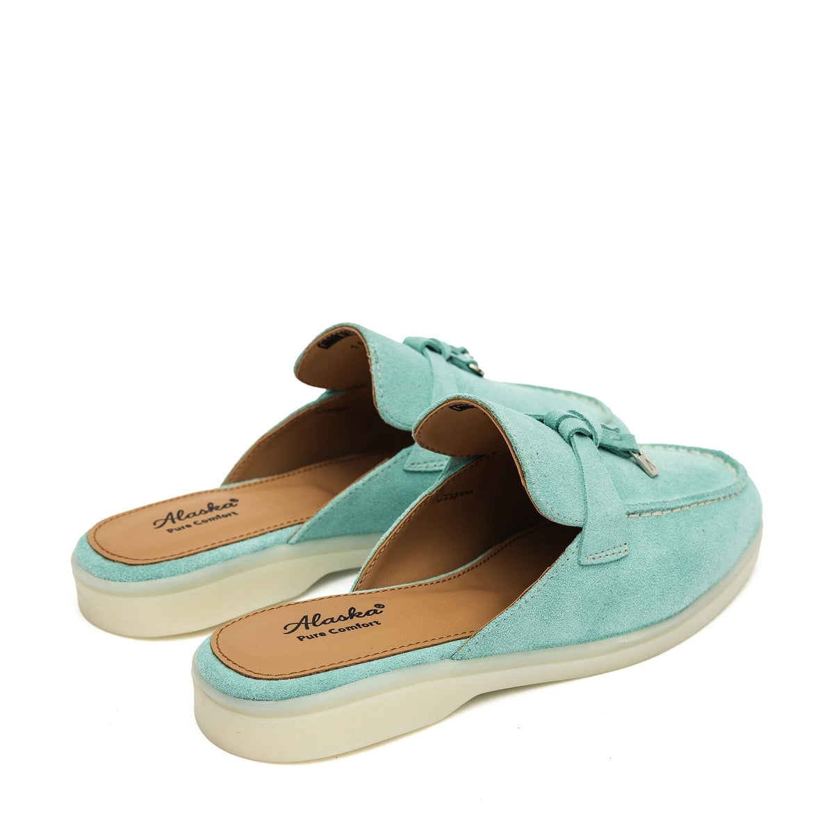 Turquoise suede mule pair viewed from the heel, showing open backs and tan insoles
