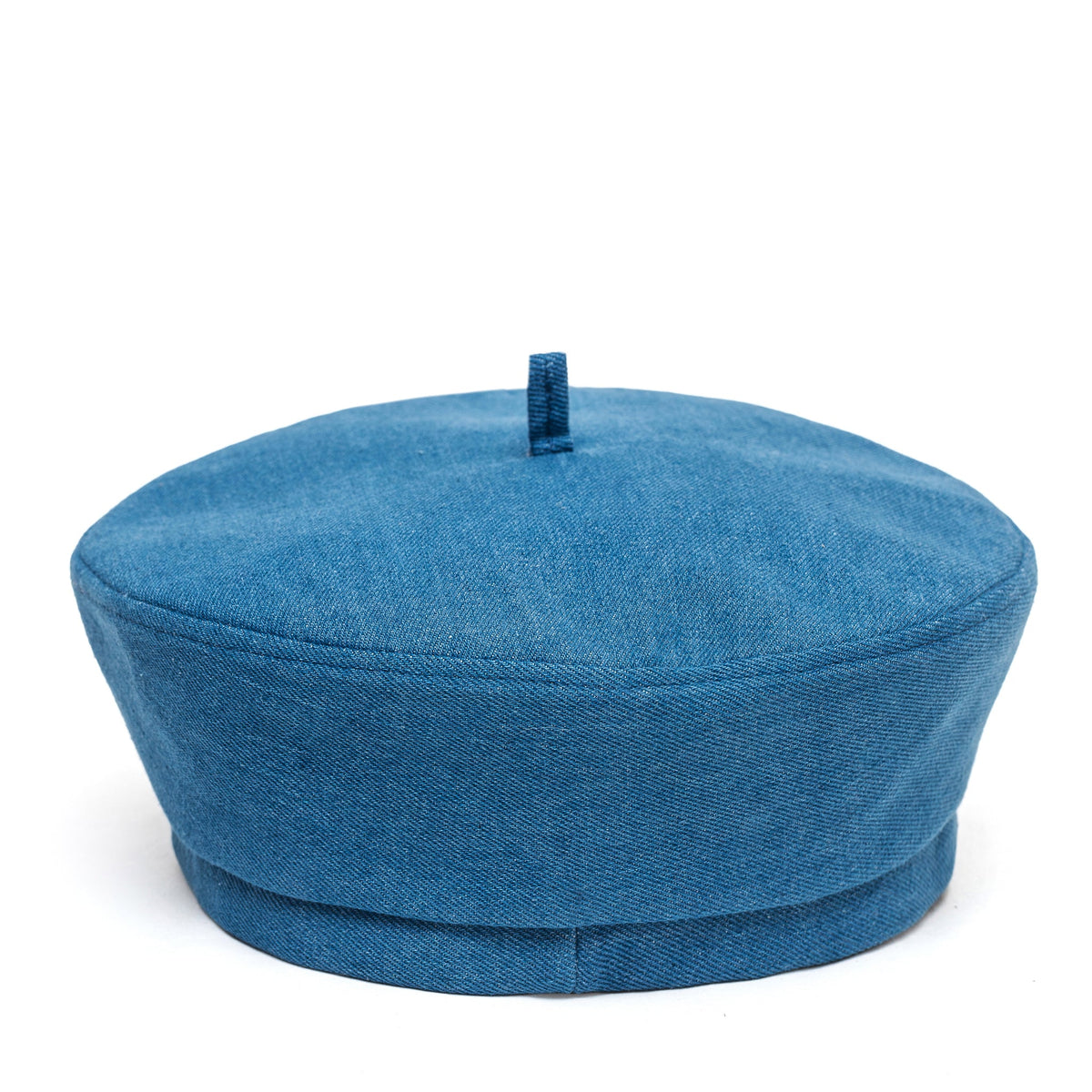 Blue Paris beret with a rounded crown, folded band, and small top tab