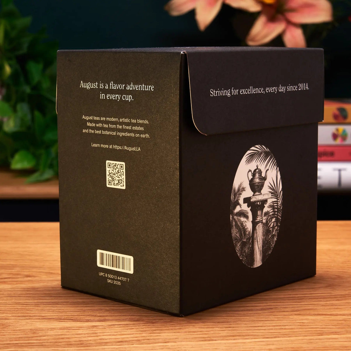 Back and side of August Uncommon tea sampler box with QR code and product details