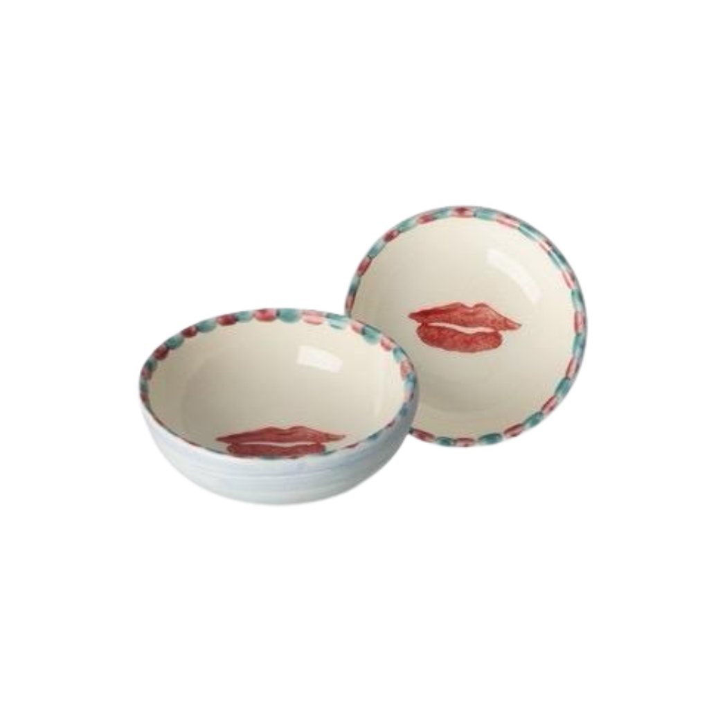 Small ceramic dipping bowl with hand-painted red lips and dotted multicolor rim