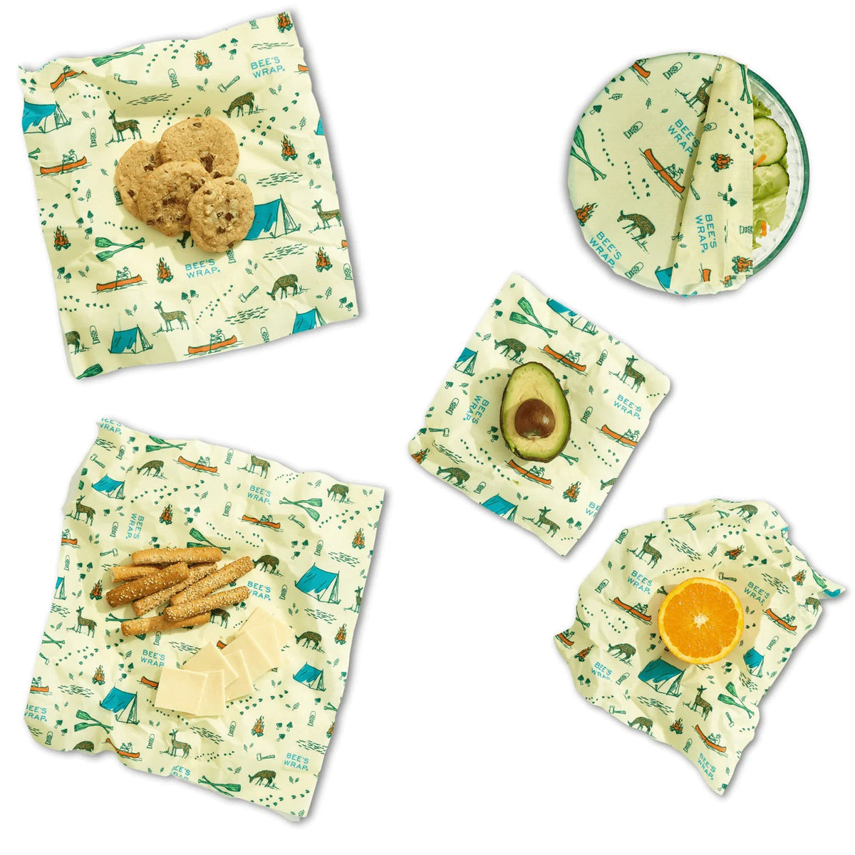 Reusable outdoor-themed food wraps in light green with forest animal and fruit prints
