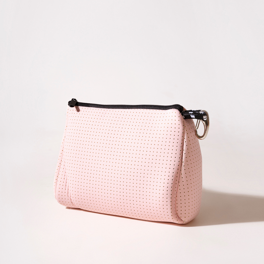 Pink zippered pouch with dotted pattern, black zipper and keyring strap