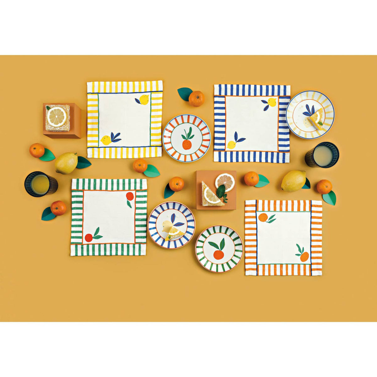 Citrus mini plates, round fruit designs arranged on a table setting
