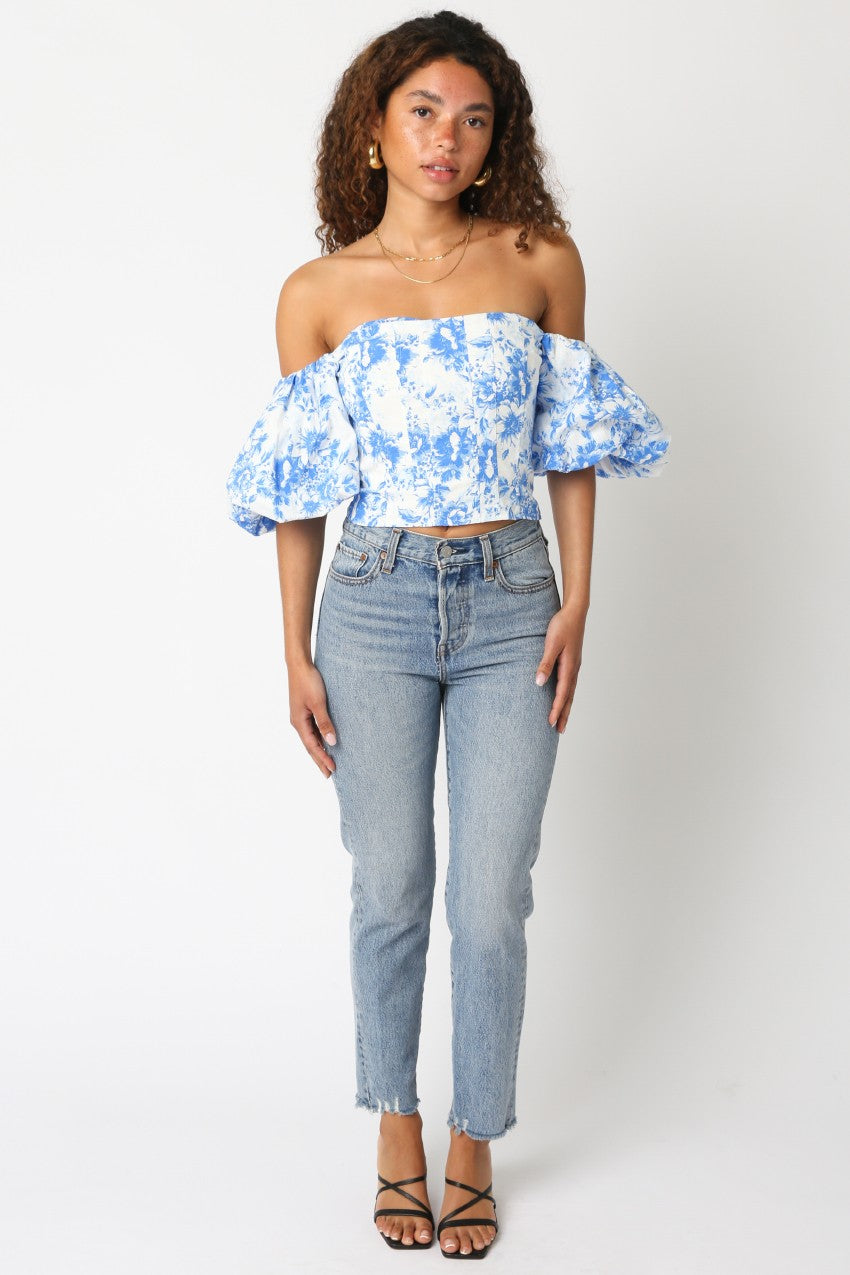 Blue floral off-shoulder puff sleeve crop top with gathered elastic neckline