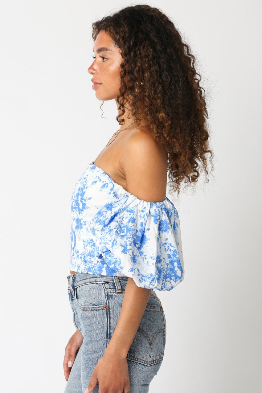 Blue floral off-shoulder puff sleeve crop top with gathered sleeve ruffles