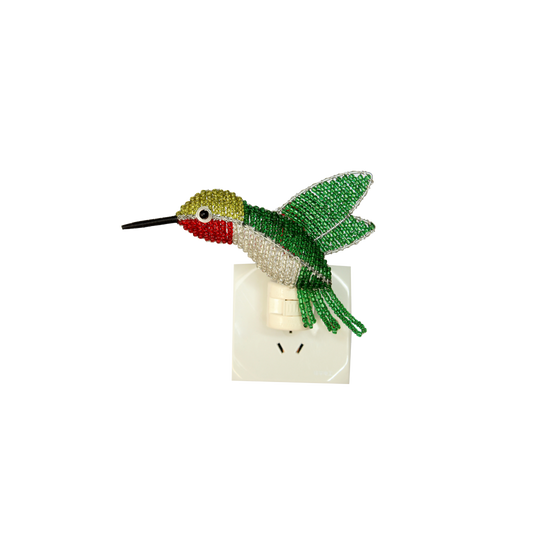 Hummingbird night light plug-in with green and red beaded bird on white outlet cover
