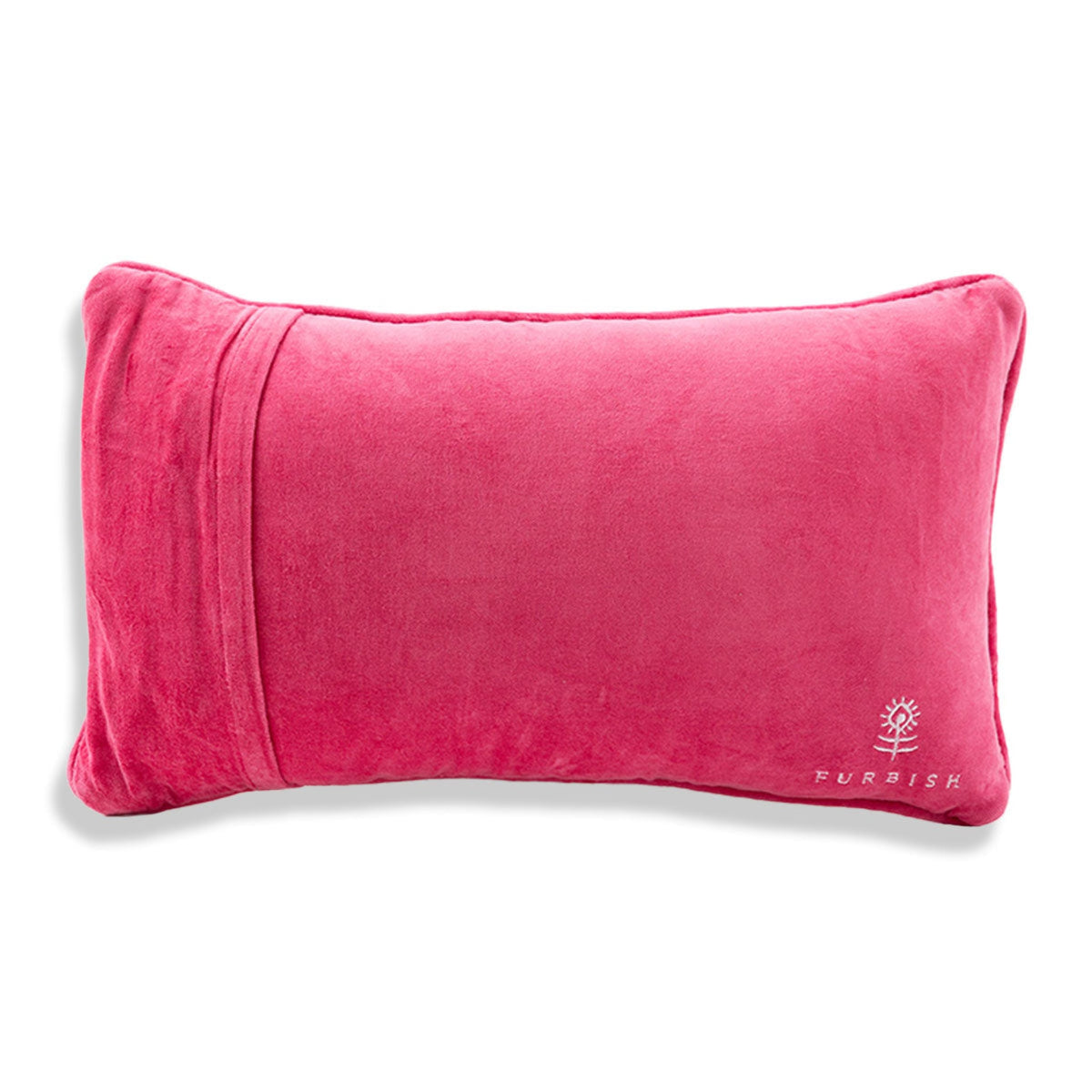 Velvet-back needlepoint pillow in solid pink with small stitched emblem