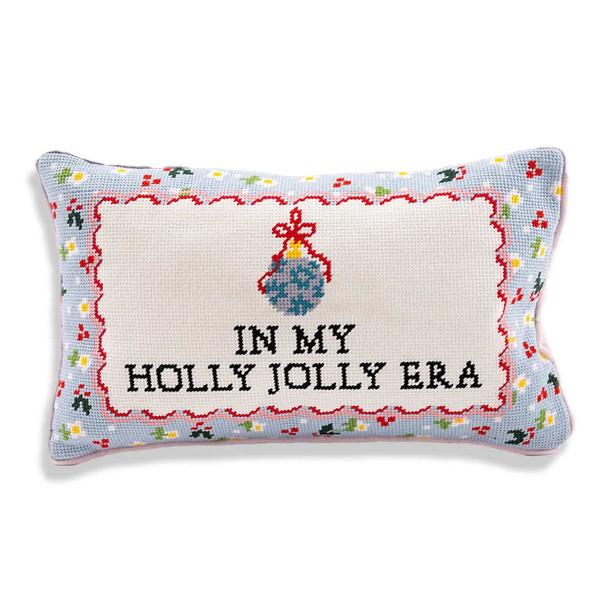 Rectangular needlepoint pillow with 'IN MY HOLLY JOLLY ERA' cross-stitch lettering