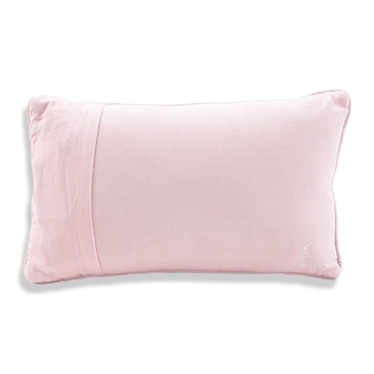 Pink fabric back of a rectangular needlepoint pillow with small embroidered mark
