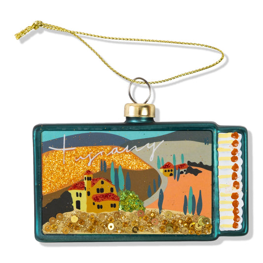 Tuscany matchbook ornament, rectangular teal glitter scene with hanging loop and gold accents