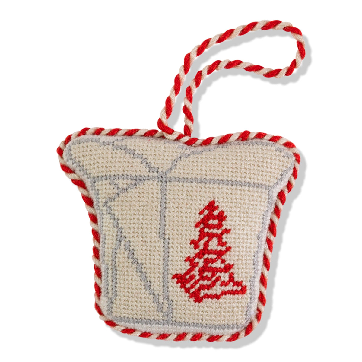 Needlepoint takeout box ornament in beige and red with striped hanging cord