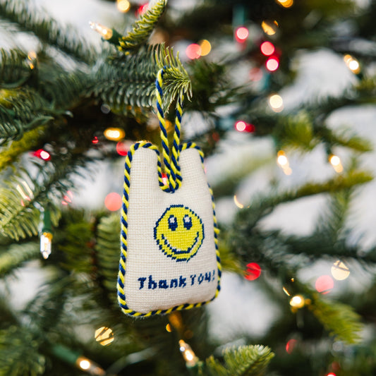 Hanging needlepoint ornament bag with smiley face and 'Thank you!' text