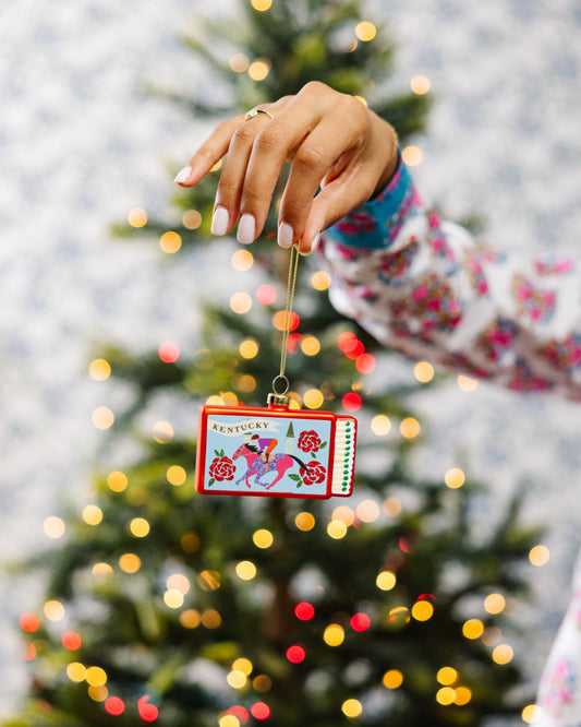 Kentucky matchbook ornament on a gold cord with red decorative front