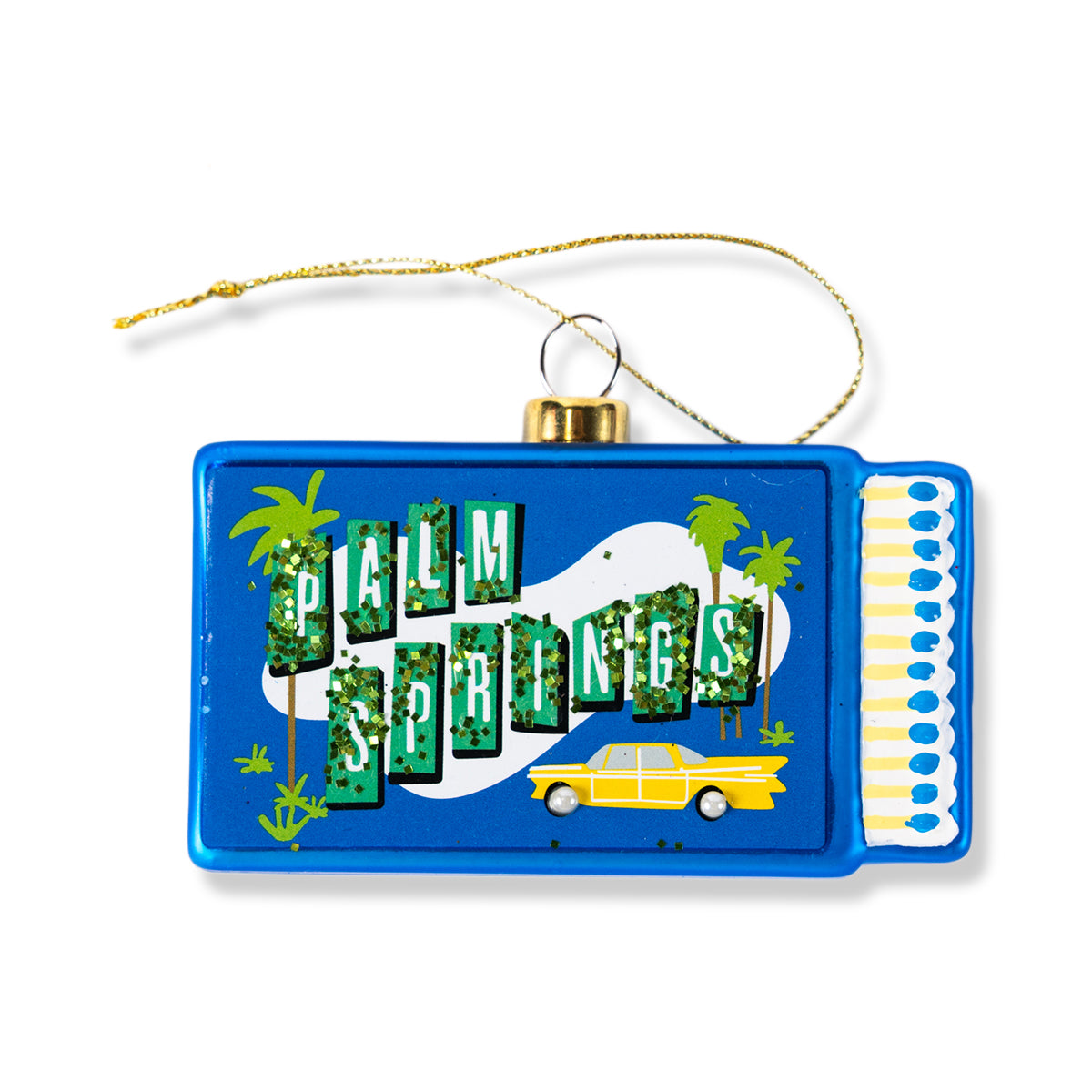 Blue matchbook-shaped ornament with gold cap and string, Palm Springs graphic